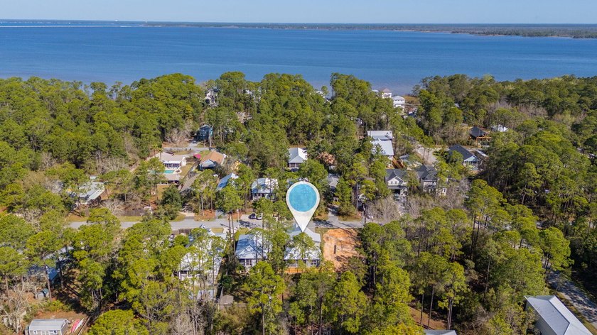 Discover coastal charm and modern luxury in this stunning Point - photo 3