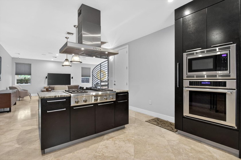 Exceptional modern 3-bed, 4-bath tri-level residence in prime - photo 46
