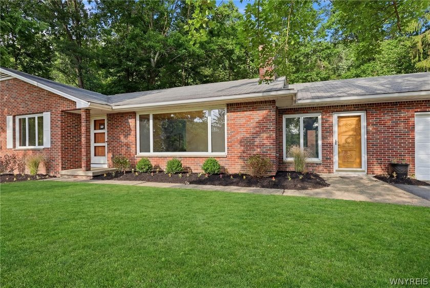8117 Boston State Road is a completely renovated ranch set far - photo 4