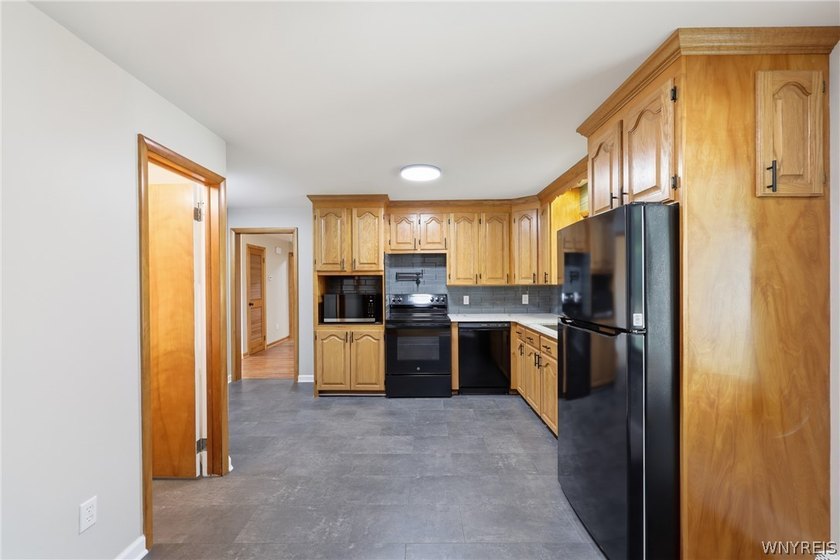 8117 Boston State Road is a completely renovated ranch set far - photo 5