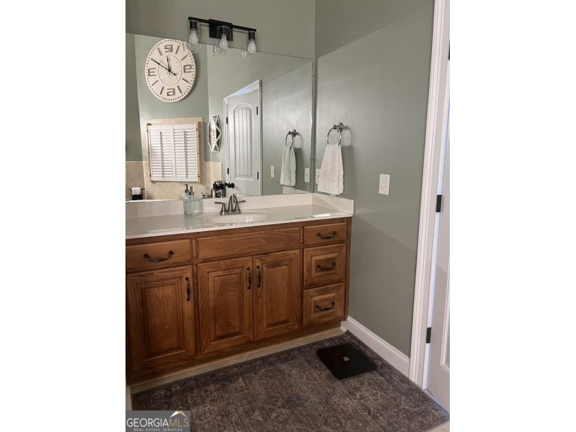 Meticulously maintained 5/4.5 bath Craftsman style home located - photo 18