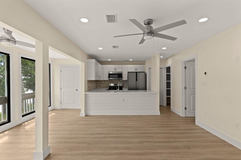 Lake front! This freshly updated condo offers a comfortable and - photo 8