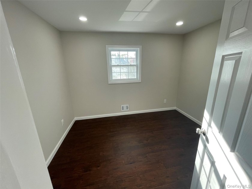 Welcome to your renovated 4-bedroom High Ranch with a bonus room - photo 8