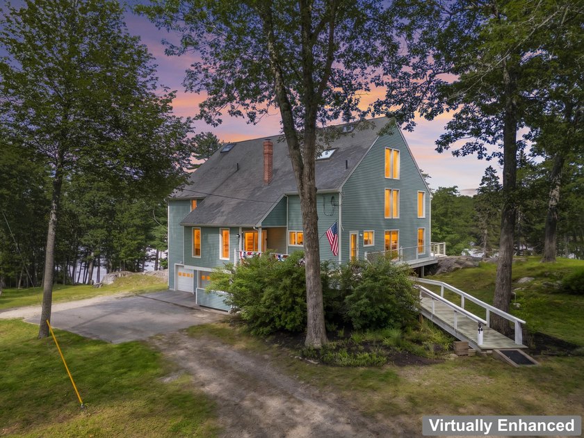 Nestled along the shore of the Kennebec River, this private 3BR - photo 12