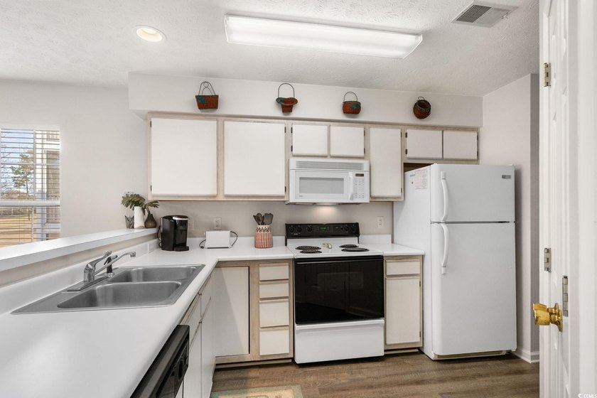 This condo is in a great location within the community &amp; is in - photo 13