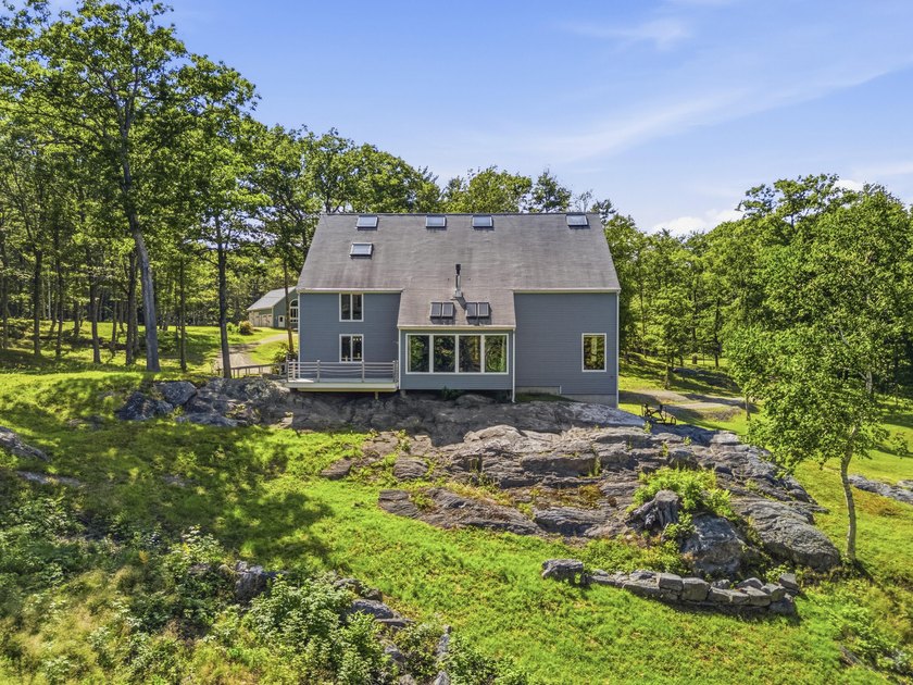 Nestled along the shore of the Kennebec River, this private 3BR - photo 14