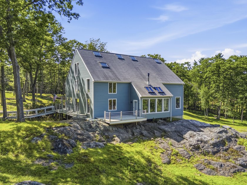 Nestled along the shore of the Kennebec River, this private 3BR - photo 16