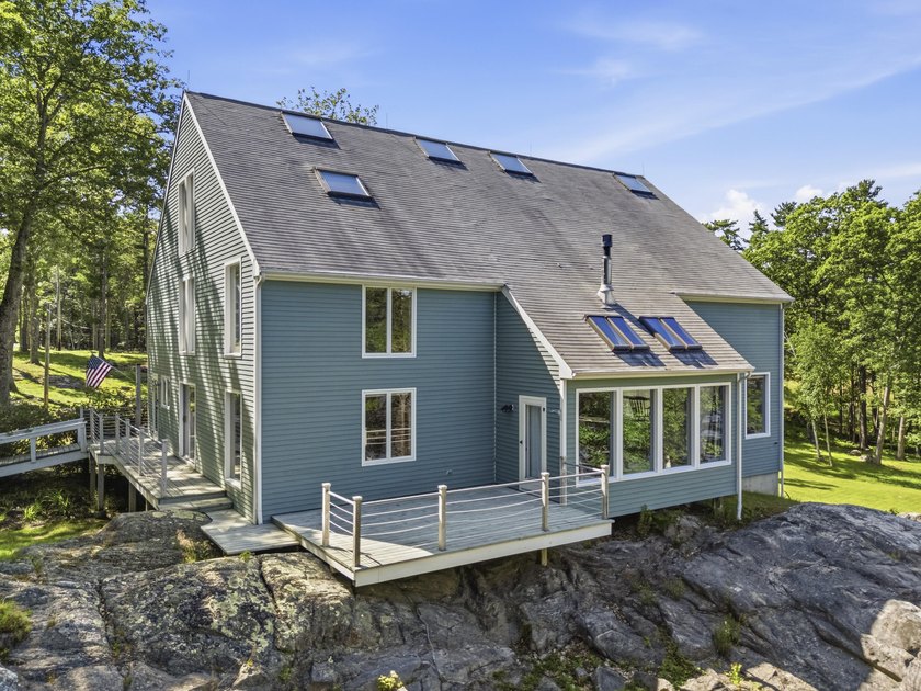 Nestled along the shore of the Kennebec River, this private 3BR - photo 17