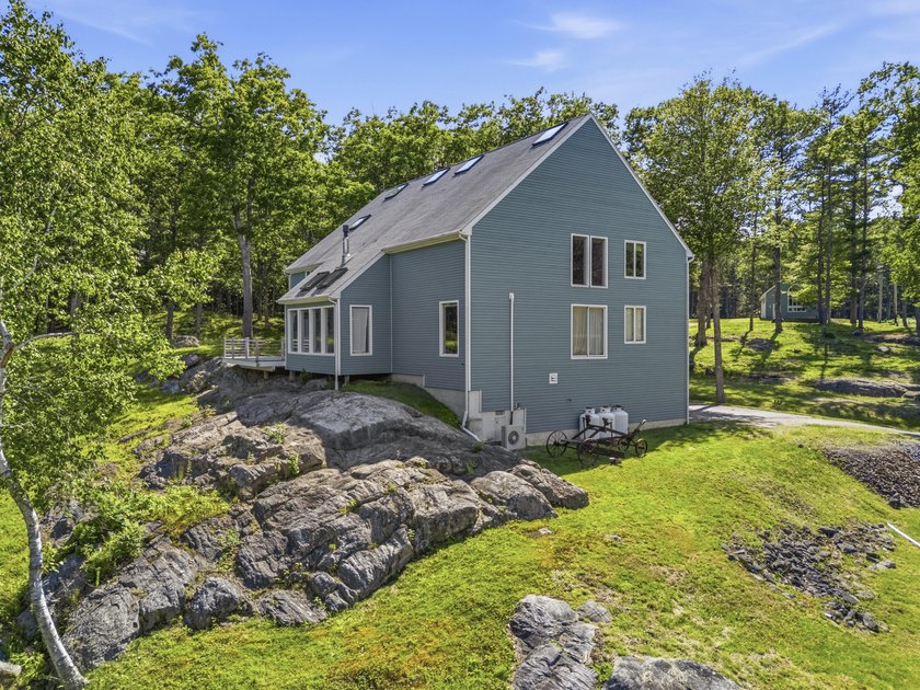 Nestled along the shore of the Kennebec River, this private 3BR - photo 19