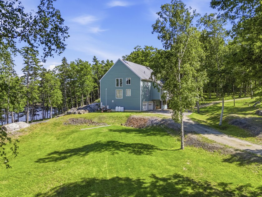 Nestled along the shore of the Kennebec River, this private 3BR - photo 20