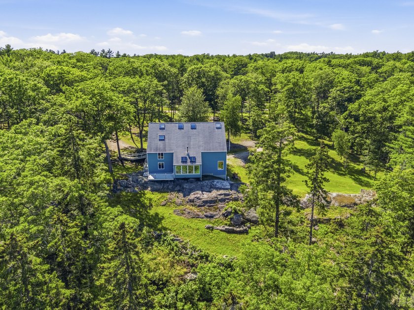 Nestled along the shore of the Kennebec River, this private 3BR - photo 23