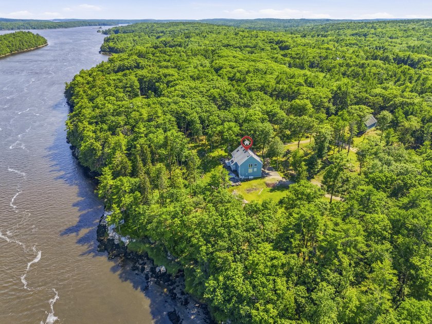 Nestled along the shore of the Kennebec River, this private 3BR - photo 26