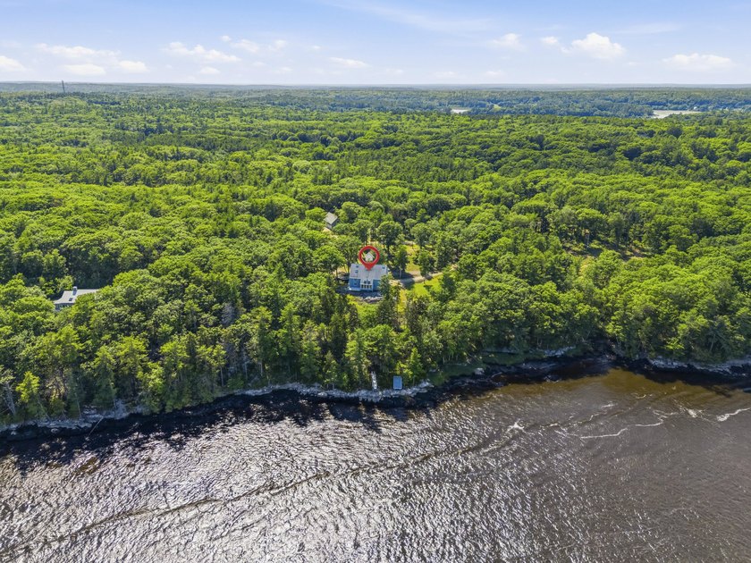 Nestled along the shore of the Kennebec River, this private 3BR - photo 30