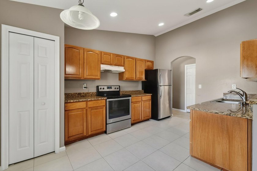 Beautifully maintained 3-bedroom, 2-bath home featuring a NEW - photo 13