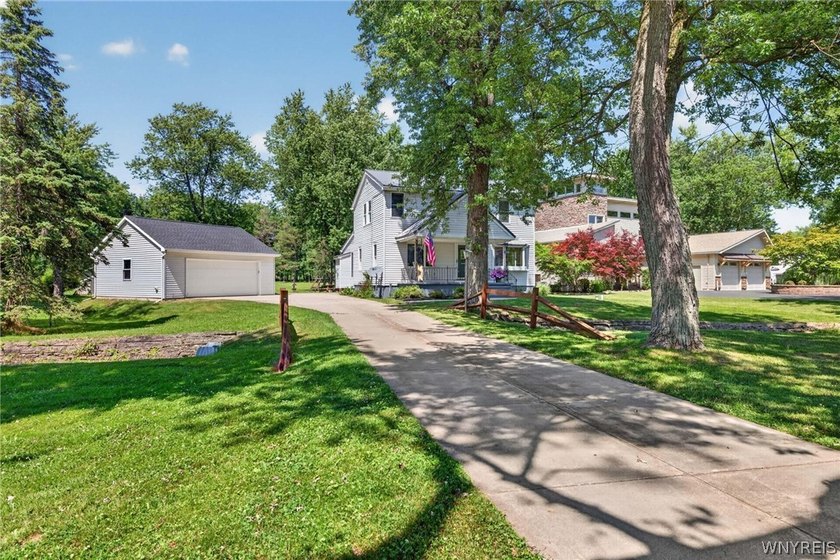 Welcome to 1890 Center Road in West Seneca! Set on 1.2 beautiful - photo 5