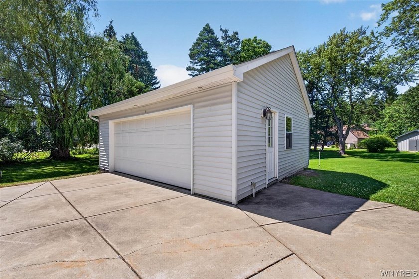 Welcome to 1890 Center Road in West Seneca! Set on 1.2 beautiful - photo 6