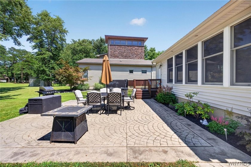 Welcome to 1890 Center Road in West Seneca! Set on 1.2 beautiful - photo 7