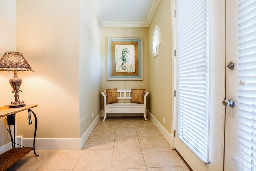 Welcome to this beautiful coastal home located on the desirable - photo 3
