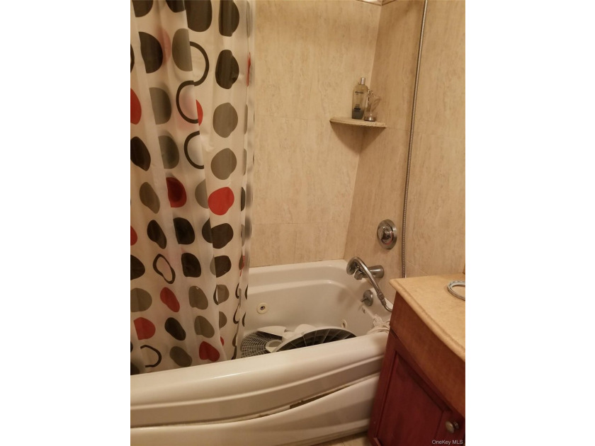 Discover this spacious 3-bedroom, 2-bath condominium residence - photo 8