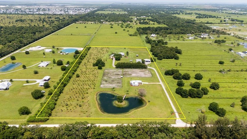 Discover this private, gated 18.1+/- acre estate. Two parcels - photo 2