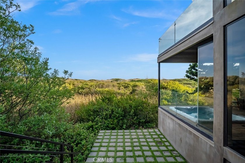 Discover luxury oceanfront living in this custom 3 bedroom, 2 - photo 46