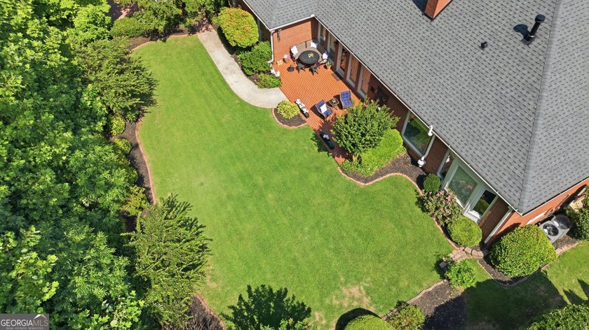 Discover this beautifully renovated ranch home in the highly - photo 3