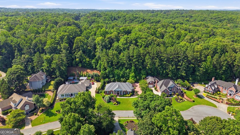 Discover this beautifully renovated ranch home in the highly - photo 6