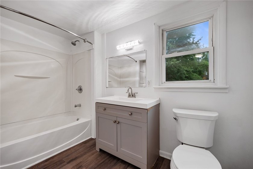 Welcome to this charming 3-bedroom, 1-bath home in Rochester's - photo 19