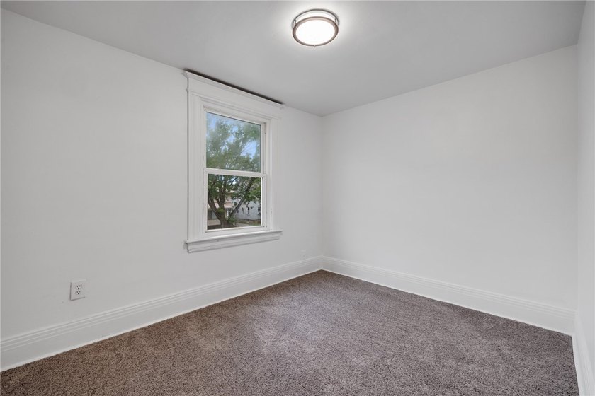Welcome to this charming 3-bedroom, 1-bath home in Rochester's - photo 24