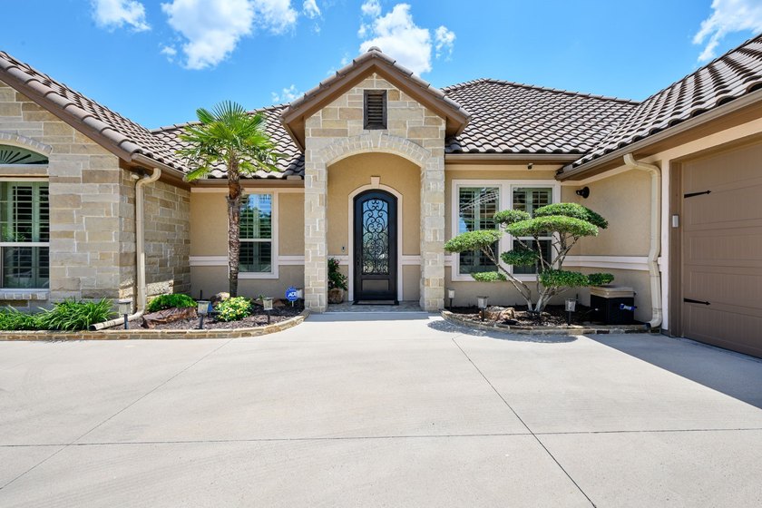 Tucked inside the coveted Catalina Bay waterfront community - photo 11