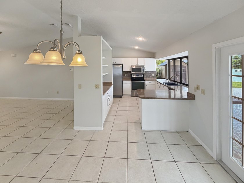 2305 SW Fern Cir is a one-story Port Saint Lucie home with a - photo 22