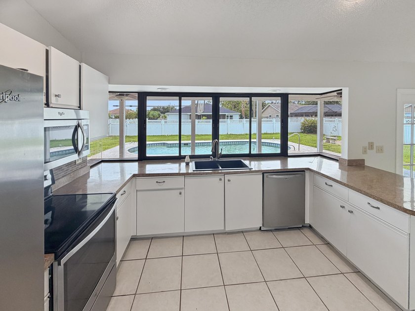 2305 SW Fern Cir is a one-story Port Saint Lucie home with a - photo 23