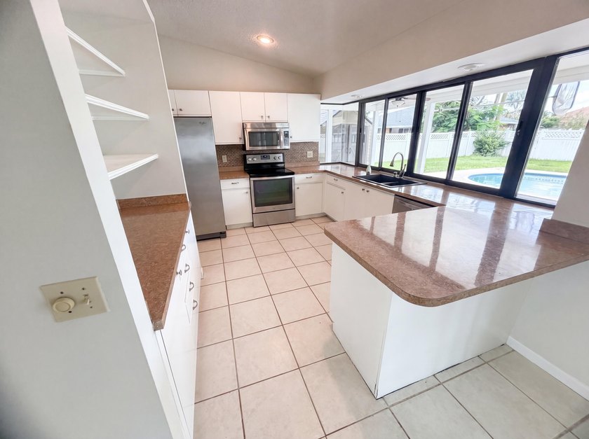 2305 SW Fern Cir is a one-story Port Saint Lucie home with a - photo 27
