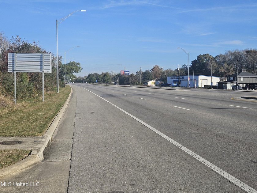 Highway 49 lots just north of Lowes, 84 Lumber and Hoods. Across - photo 2