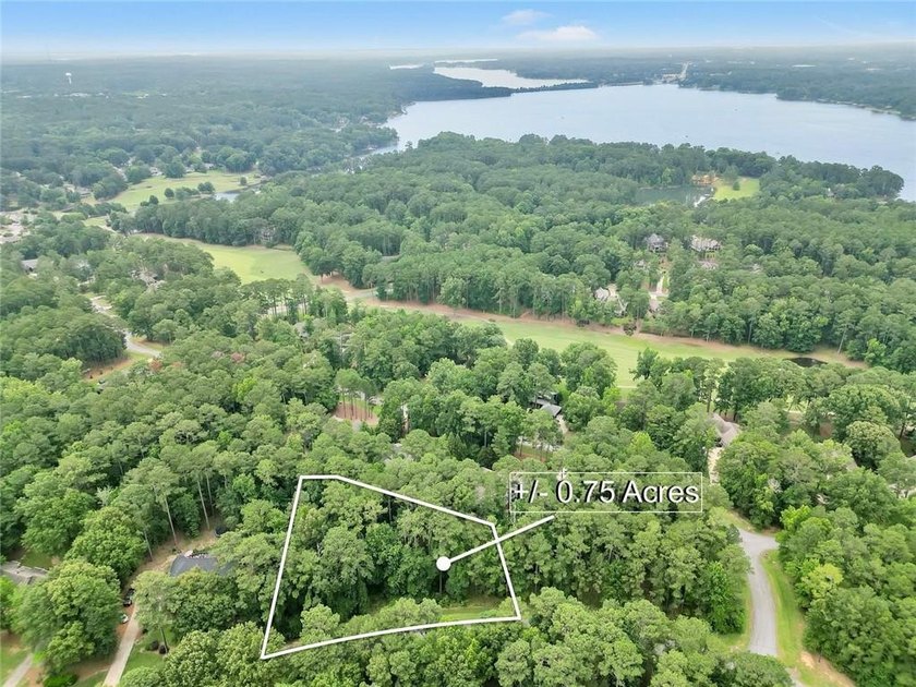 Your dream home begins here! Nestled among mature hardwoods in - photo 3
