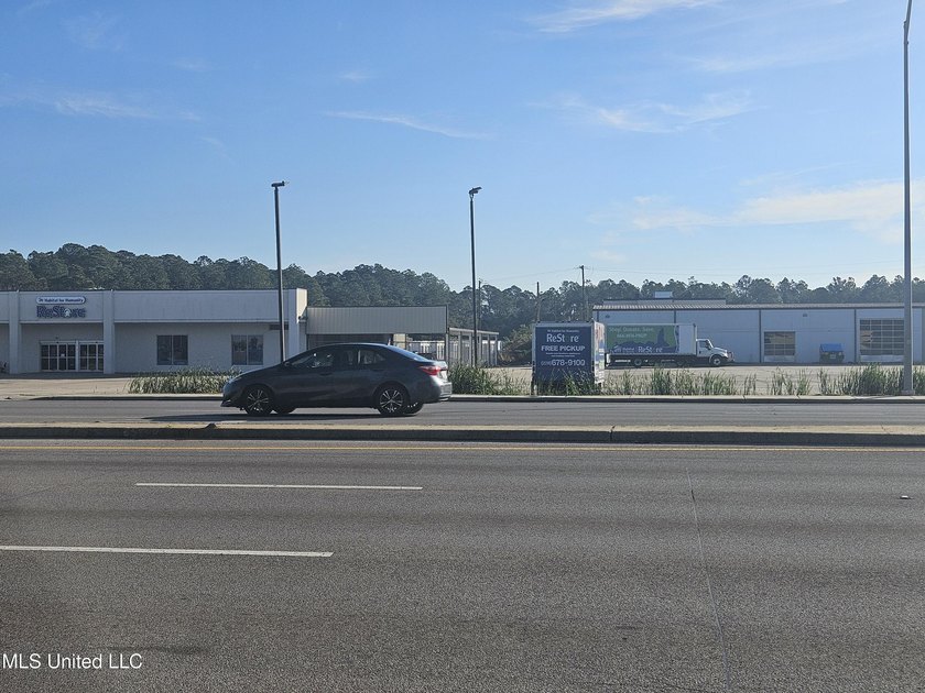 Highway 49 lots just north of Lowes, 84 Lumber and Hoods. Across - photo 4
