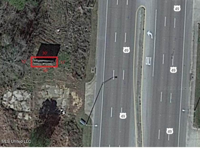 Highway 49 lots just north of Lowes, 84 Lumber and Hoods. Across - photo 9