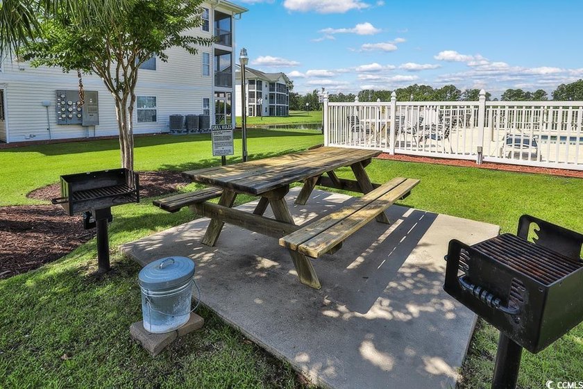Great golf course and water views from this top floor condo in - photo 12