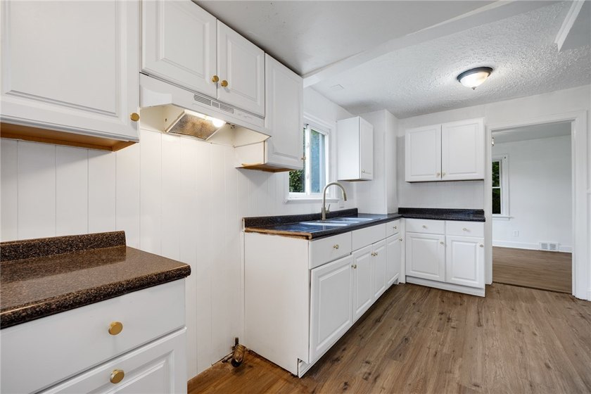 Welcome to this beautifully refreshed 3-bedroom, 1-bath home - photo 13