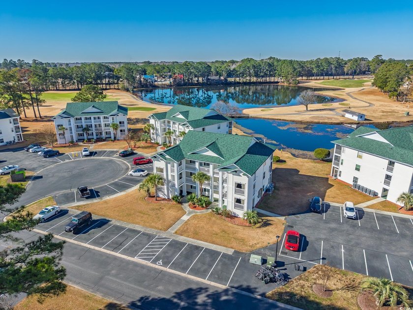 Great golf course and water views from this top floor condo in - photo 14