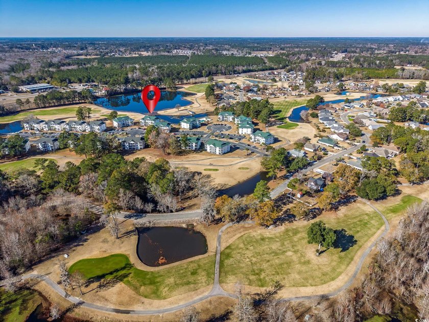 Great golf course and water views from this top floor condo in - photo 17