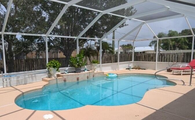 This freshly painted spacious pool home sits on a corner lot - photo 30