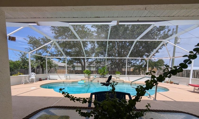 This freshly painted spacious pool home sits on a corner lot - photo 34