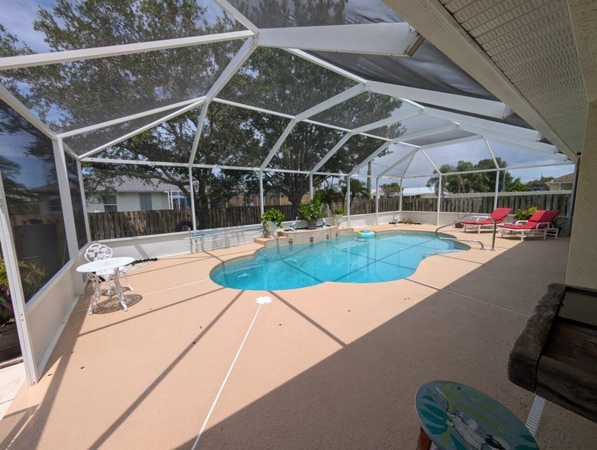 This freshly painted spacious pool home sits on a corner lot - photo 38