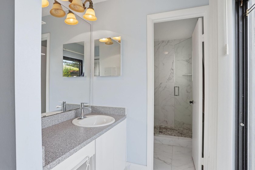 Welcome to this beautifully updated one-story pool home in - photo 12