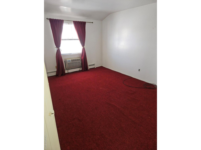 Nicely maintained 2 family home with wood floors. 1st floor has - photo 13