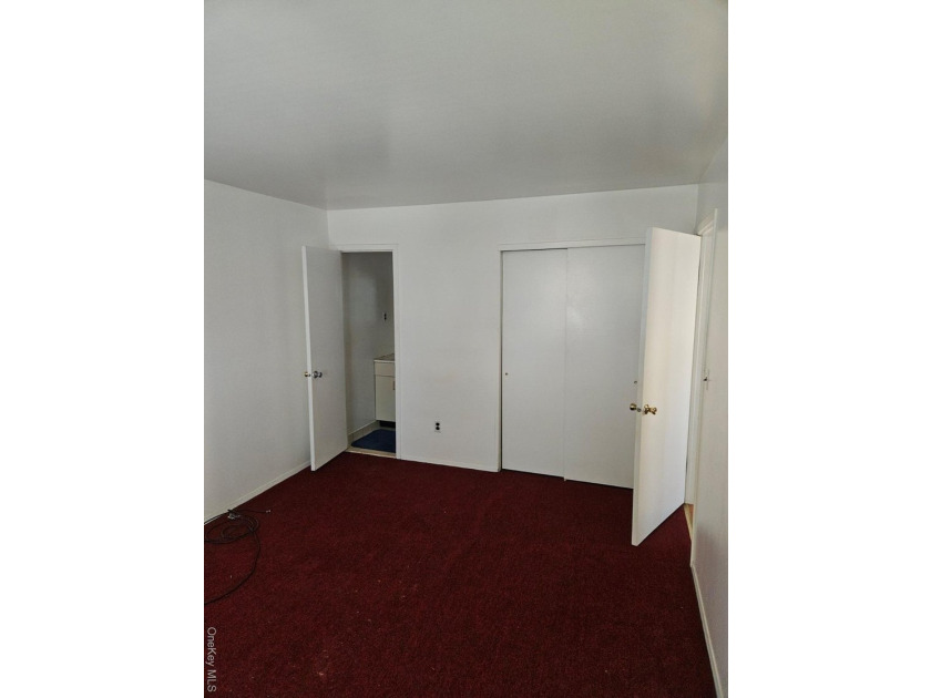 Nicely maintained 2 family home with wood floors. 1st floor has - photo 14