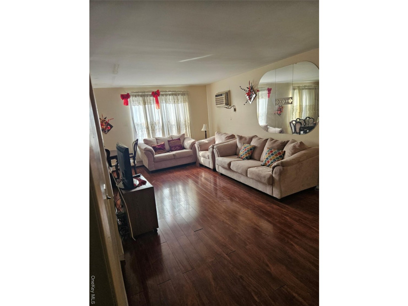 Nicely maintained 2 family home with wood floors. 1st floor has - photo 17