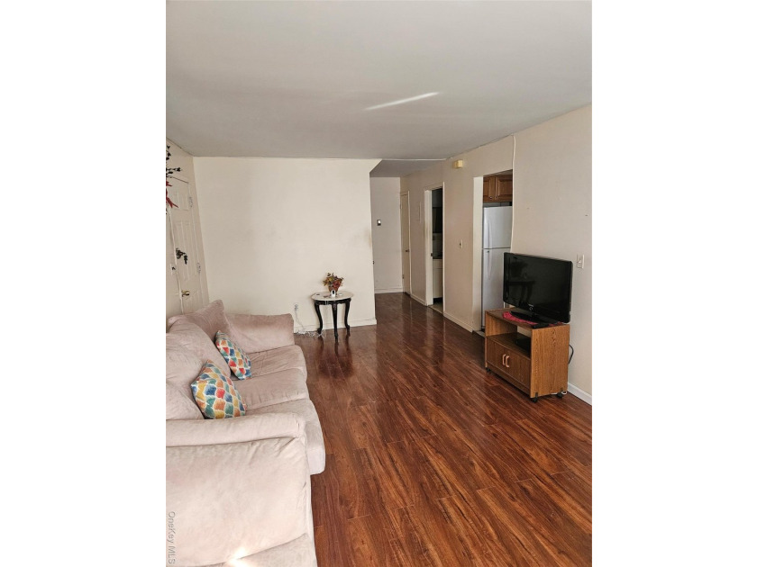 Nicely maintained 2 family home with wood floors. 1st floor has - photo 19
