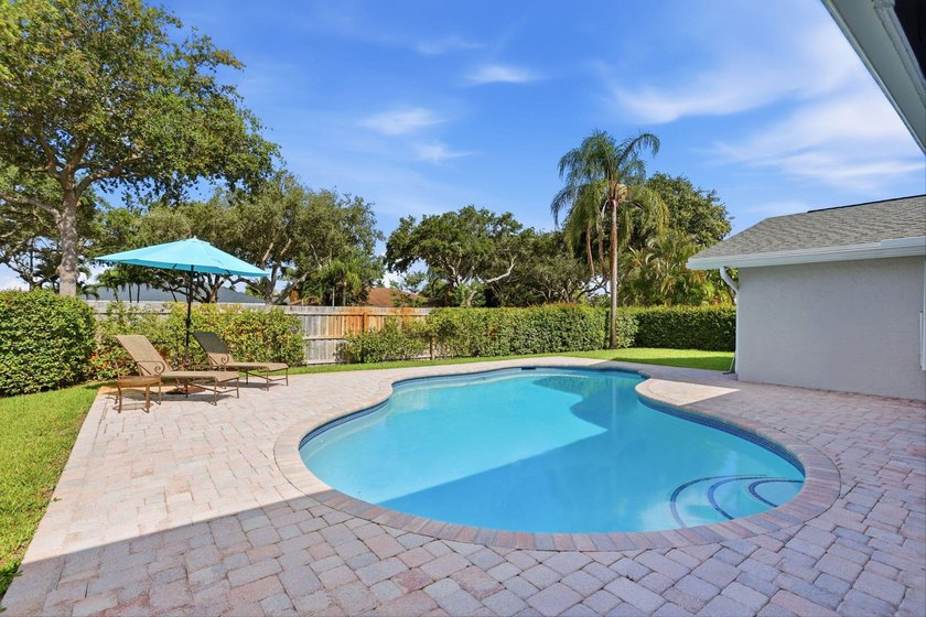 Welcome to this beautifully updated one-story pool home in - photo 19